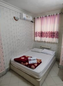 اتاق هتل آپارتمان مهرگان مشهد