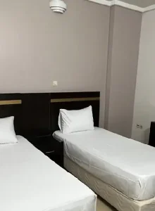 اتاق دو تخته در هتل آپارتمان فرادیس مشهد