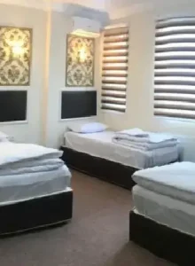 اتاق چهار نفره هتل آپارتمان وطن مشهد